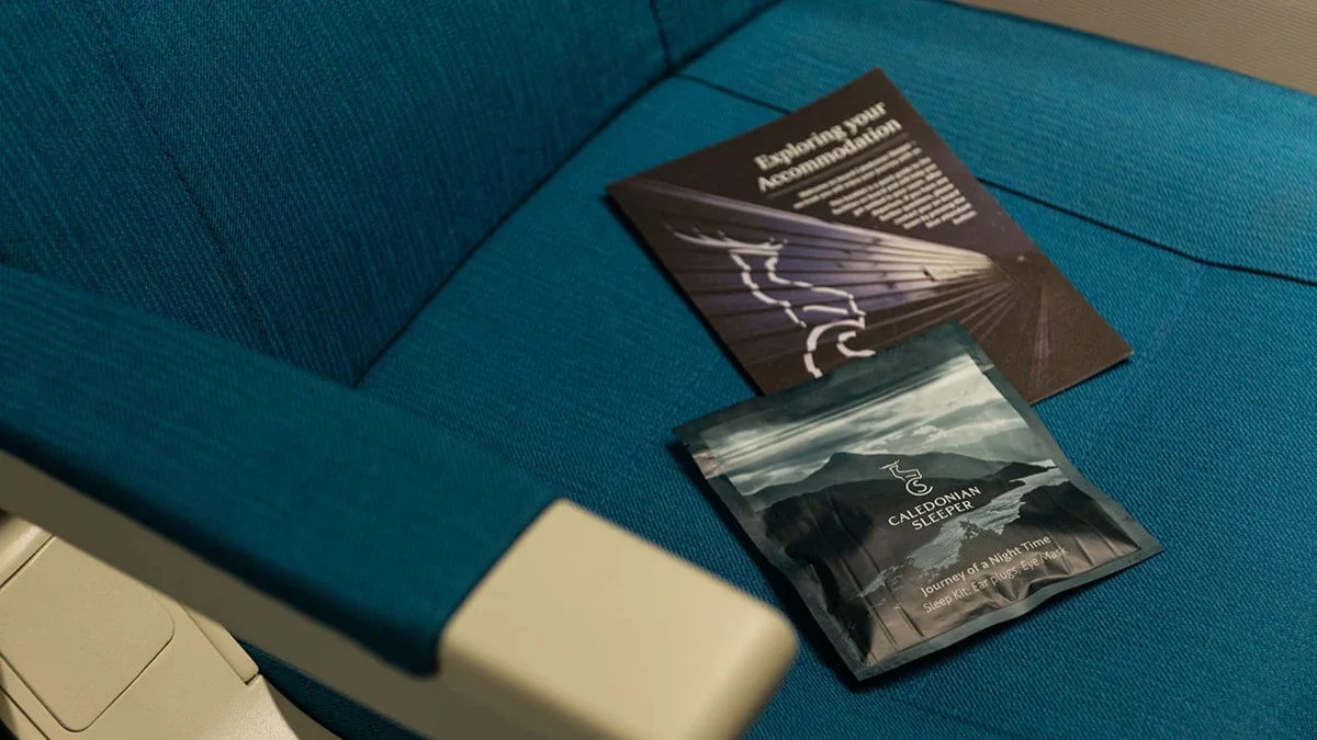 Caledonian Sleeper reclining seat with a Caledonian Sleeper sleep kit